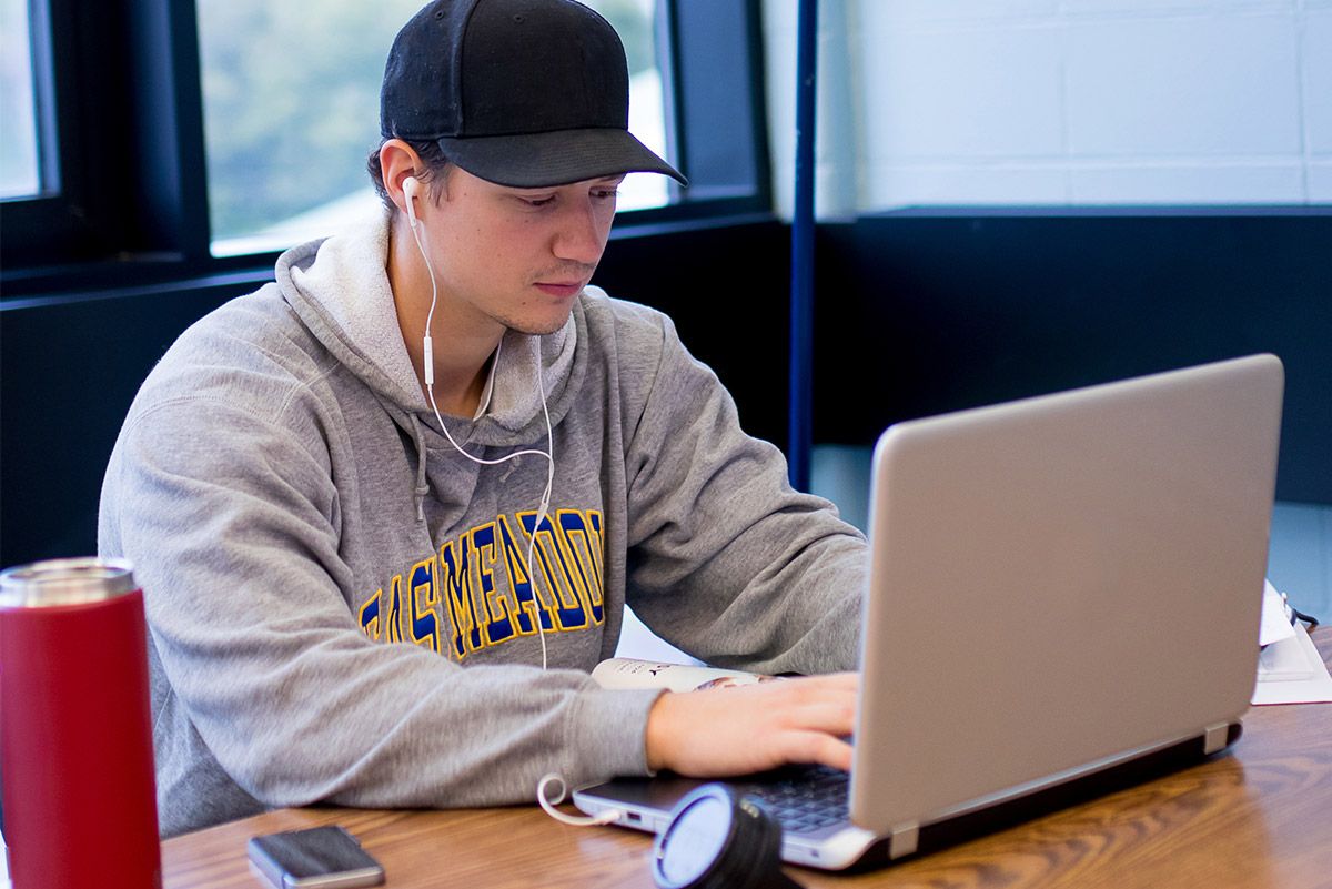 Male student at laptop